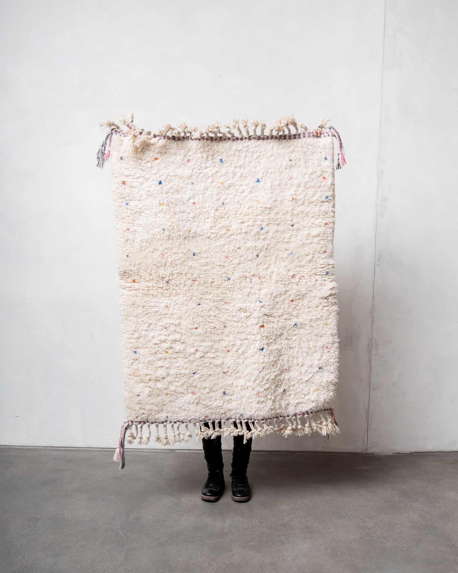 Modern, designer, handcrafted Berber rug from Morocco. Beniourain carpet with beautiful colours and patterns and fluffy wool texture.